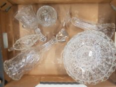 A collection of glass and crystal ware items to include fruit bowl, crystal decanter, vase, lidded