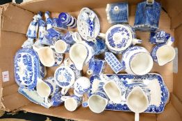 A mixed collection of Delft & similar Figures & houses, Blue & White jugs & sugar pots etc