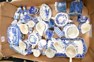 A mixed collection of Delft & similar Figures & houses, Blue & White jugs & sugar pots etc