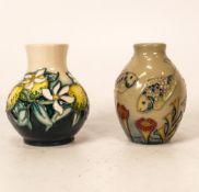 Two Moorcroft miniature vases in the Lemon tree and Fish design. Both Boxed