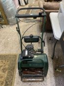 Used Atco Balmoral petrol lawnmower plus grass boxes and spare blade drums.