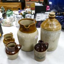 A collection of Stoneware GPO & similar Stoneware Flagons & Jugs, tallest 34cm(5)