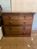 Late Victorian 2 over 3 chest of oak drawers raised on a plinth base.
