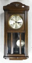 Oak Cased Art Deco Wall Clock, length 77cm