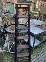 Vintage set of wooden lattice step ladders.