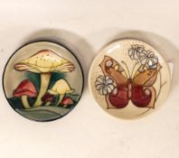 Two Moorcroft pin dishes in the Claremont revival and Butterflies pattern. Both Boxed