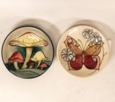 Two Moorcroft pin dishes in the Claremont revival and Butterflies pattern. Both Boxed