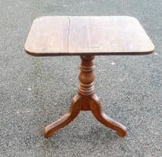 Victorian oak tip top table on tripod supports, split top.