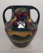 Moorcroft Twin handled vase with sinuous tree decoration 18cm height. Red dot seconds