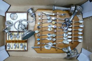 A mixed collection of items to include silver plated candlesticks, cased tea spoons , decorative