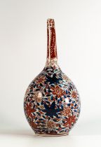 Meiji Period (1868–1912), bottle shaped Imari vase, decoration of stylised flora in underglaze
