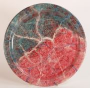 Lise B. Moorcroft cast charger, late 80's with marbled decoration, diameter 27cm