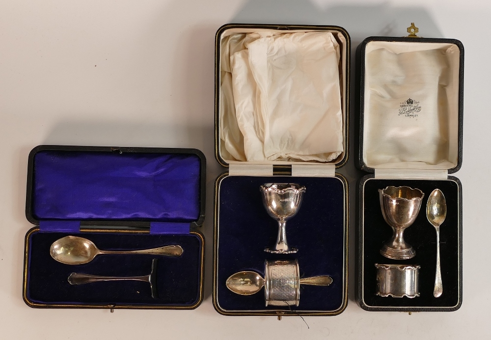 3 assorted hallmarked silver christening sets, cased, some initials and dents noted on some on