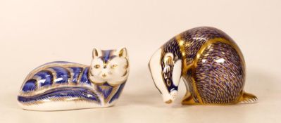 Royal Crown Derby paperweights to include Artic Fox and BAdger . Both gold stoppers (2)