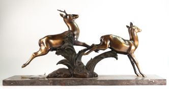 A. Soleau, bronze Art Deco figure on marble base, modelled as polished bronze deer and doe