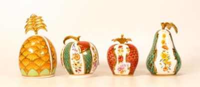 A collection of Royal Worcester fruit themed candle snuffers to include Strawberry, Pear, Apple &