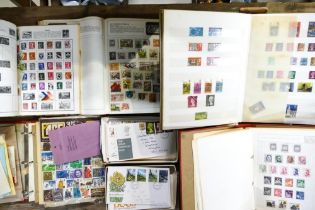 Job lot of UK & world stamps in various albums etc. UK FDC First day covers etc. A large quantity.