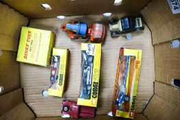 A collection of Corgis and Dinky toy cars to include John Woolfe Dragster, Surtees T S 9 racing car,