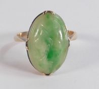 9ct gold ring set with carved Jade oval stone, ring size O/P, 4.2g.