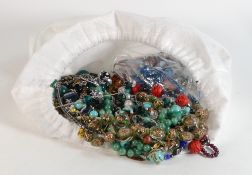 A large collection of various vintage beads, including decorative glass, hardstone, costume beads