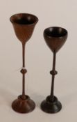 High quality treen turned rosewood stemmed cups of unknown origin, age or use. Largest 15cm high.