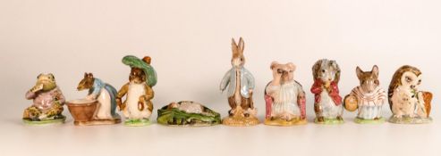 A collection of Beswick & Royal Albert Beatrix Potter figures to include - Mrs Tittlemouse (2a),