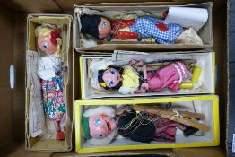 Four Pelham puppets to include Macboozle , Gypsy girl, Dutch boy and Mitzi girl. All boxed