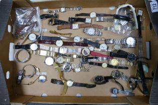 A collection of mens & lady's wrist watches , some spares but mostly unchecked