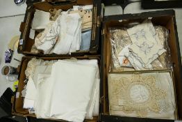 A large collection of Lace & embroidered items including table cloths, place mats, doylies etc(3