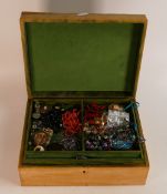 A collection of vintage costume jewellery including beads, necklaces, pendants in jewellery box.