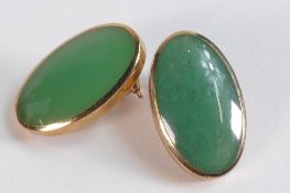Pair 9ct gold gold earrings each set with oval green possible Jade stones, 7.7g.