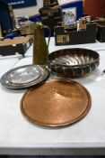 A collection of metal ware to include H Barnes signed hand beaten copper plate, J S & S branded