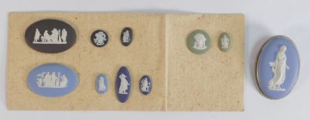 A collection of Wedgwood jasperware miniature roundells in various colours and silver mounted oval