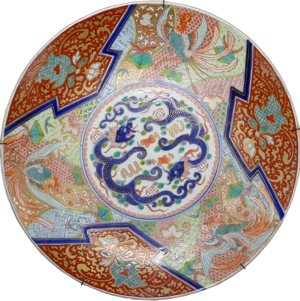 19th century Japanese porcelain large charger, decorated with two dragons to the centre with birds