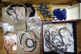 A large collection of modern costume jewellery including beaded necklaces, ear rings, studs,