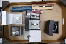 A collection of boxed ladies watches including Guess, Rotary, Sekonda, DKNY, Montine etc