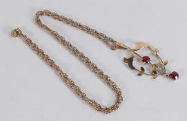 9ct gold necklace with 9ct Art Noveau pendant set with red stones, 4.2g.