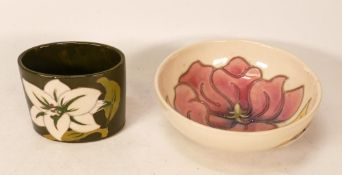 Moorcroft Magnolia bowl together with African Lily small oval vase. Diameter of bowl 12cm, height of