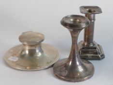A collection of Silver items including inkwell and two filled odd candlesticks. (3)