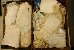 A large collection of Lace & embroidered items including table cloths, place mats, doylies etc(2