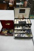 A large collection of ladies costume jewellery in leather typw 7 drawer box including rings,