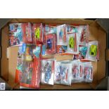A collection of Carded Disney Pixar Cars , Disney Ice Racers Model toy cars (12)