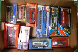 A collection of Boxed Model Toy Buses including Corgfi Metro Bus, Golden Wheel Routemaster, Creative