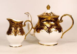 De Lamerie Fine Bone China heavily gilded Burgundy Majestic Pattern Teapot & Milk Jug, specially
