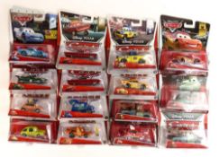 A collection of Carded Disney Pixar Cars & Disney World Of Cars Model toy cars (17)