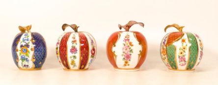 A collection of Royal Worcester fruit themed candle snuffers to include Apple, Pum, Peach & Green