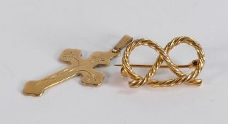 9ct gold staffordshire knot brooch and 9ct gold cross, 4.6g.