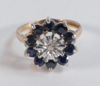 9ct gold dress ring set with dark blue and white stones,size O/P, 3g.