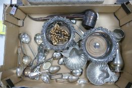 A mixed collection of silver plated items including loose cutlery, bottle stands, shell shaped