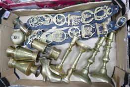 A mixed collection of metal items to include Brass Horse Brasses, Tourist Type Miners lamps, Desk